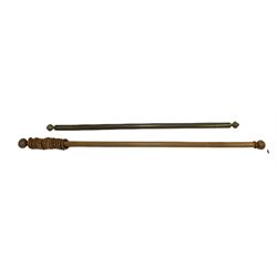 Edwardian brass curtain pole with reeded ball finials, L165cm and a fruitwood curtain pole with sixteen rings and turned ball finials, L193cm (2)