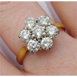 18ct gold seven stone round brilliant cut diamond cluster ring, London 1996, total diamond weight approx 0.80 carat