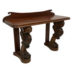 19th century rosewood console table, moulded rectangular top with raised shaped back, on two scrolled supports carved with c-scroll shells and acanthus leaf, terminating at scale carved ball and claw feet, on shaped block platforms