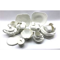 Collection of Shelley white Dainty tea ware including cups, saucers, plates, bread and butter plates, tea pot, milk jug etc (57)