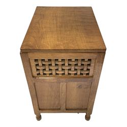 'Oakleafman' oak Hi-Fi or record cabinet, adzed rectangular hinged lid over lattice panels, triple panelled fall front enclosing LP compartment, by David Langstaff of Easingwold