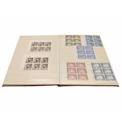 Queen Elizabeth II mint decimal stamps, housed in a stockbook, face value of usable postage approximately 75 GBP