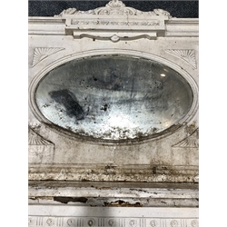 Early 20th century Georgian revival cast iron fire surround  of classical design, the over mantel with shell, acanthus leaf and fruit pediment and original oval mirror, frieze decorated with urn issuing harebell swags, with further harebells to uprights aperture 94cm x 96cm