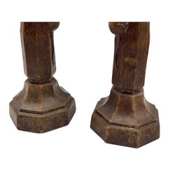 Mouseman - pair circa. 1940s oak candlesticks, tapered octagonal stem on shaped and stepped base, carved with mouse signature, by Robert Thompson of Kilburn, H20cm