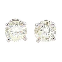 Pair of 18ct white gold round brilliant cut diamond screw back stud earrings, hallmarked, total diamond weight approx 1.00 carat