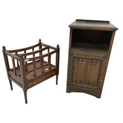 Early 20th century oak bedside cabinet with carved panelled door enclosing two shelves (42cm x 40cm x 77cm); early 20th century oak two division canterbury (47cm x 34cm x 53cm)