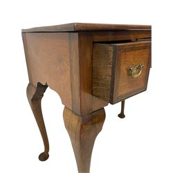 Georgian design walnut lowboy, rectangular bookmatched top over three oak-lined drawers each with featherbanded and cock-beaded facias, the shaped apron over cabriole supports