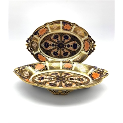 Pair of Royal Crown Derby oval footed dishes, decorated in the Imari pattern with acorn and oak leaf pierced moulded handles, date marks for 1916 & 1935, L23.5cm 