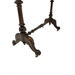 Victorian mahogany drop leaf table, the oval drop leaf top over gate leg action and turned supports, terminating in ceramic castors 