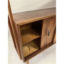 Mahogany and pine sideboard, one cupboard and shelf over one base with sliding doors, opening to reveal one fixed cupboard, raised on squared tapering supports 