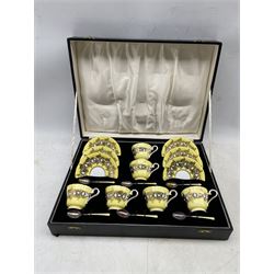 1950's cased set of six Aynsley cups and saucers, yellow and gilt decorated with a set of six silver guilloche enamel teaspoons by Turner & Simpson, 1957, pattern no. 1215