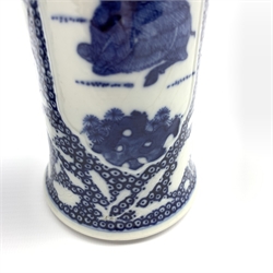 Pair of Chinese blue and white cylindrical vases, painted with Buffalo within moulded panels on a cell-ground reserved with butterflies with incised details, H28.5cm