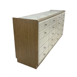 Haberdashery cabinet, the glazed display top and front, fitted with twenty drawers
