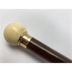 1920's snakewood walking cane with 9ct gold collar inscribed J.E.W dated 22.6.23 with spherical ivory finial, L93cm