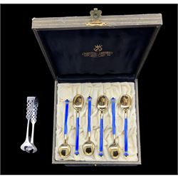 Set of six Norwegian silver gilt and blue enamel coffee spoons with leaf shape finials by David Andersen in case and a pair of David Andersen silver sugar tongs
