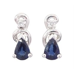 Pair of 14ct white gold pear cut sapphire and diamond stud earrings, Sheffield 2001