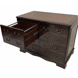 Georgian style mahogany four drawer filling cabinet, the moulded top with inset leather, shaped bracket supports
