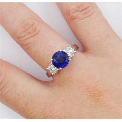 18ct white gold three stone fine sapphire and round brilliant cut diamond ring, hallmarked, sapphire approx 2.60 carat, total diamond weight approx 0.80 carat