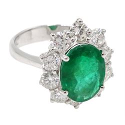 18ct white gold oval emerald and diamond cluster ring, stamped 750, emerald approx 2.85 carat, total diamond weight approx 1.60 carat