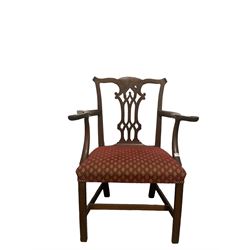 19th century mahogany framed elbow chair, the shaped cresting rail over pierced splat over upholstered seat in red fabric, raised on squared supports