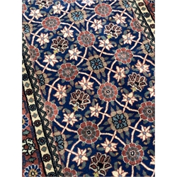 Persian Veramin ground runner rug, with repeating floral decoration enclosed by multi line border, 287cm x 80cm