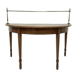 19th century mahogany demi lune table, the brass gallery over plain top and inlaid frieze, raised on square tapered supports 