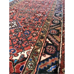 Large washed red ground Persian Hamadan village runner, all over design 330cm x 115