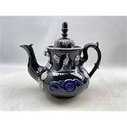 Bargeware teapot applied with floral sprigs, birds and snakes, inscribed 'J. Hornsey, H32cm