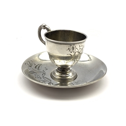  19th century Russian silver cup and saucer with engraved foliate decoration, D12cm (saucer) 4.2oz  