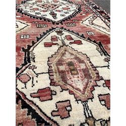 Vintage Persian runner rug, ivory triple medallion on red field with geometric decoration, enclosed by guarded border 277cm x 107cm
