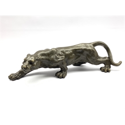 Bronze figure of a crouching cougar after 'Milo', L42cm