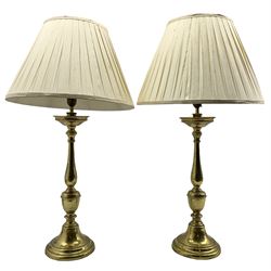 Pair of of 20th century brass lamps with baluster stem, drip pans and circular bases, H46cm 