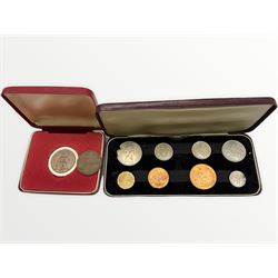 King George VI 1950 and 1951 pennies and a Queen Elizabeth II 1966 specimen coin set, cased