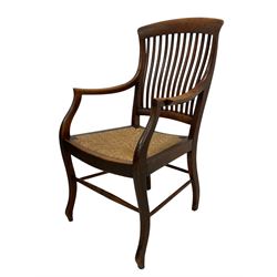 Set of six (4+2) early 20th century oak country dining chairs, slat back over drop-in rush seats, raised on cabriole supports united by ring-turned stretchers
