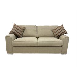 Alstons large two seat sofa, upholstered in cream fabric with scatter cushions, raised on recessed castors W200cm, H95cm, D95cm 