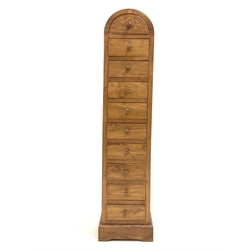20th century hardwood tall multi drawer chest, with arched top and fitted with ten drawers, plinth base, W30cm, H140cm, D25cm