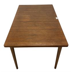 Mid-20th century teak extending draw-leaf dining table, raised on cylindrical tapering supports