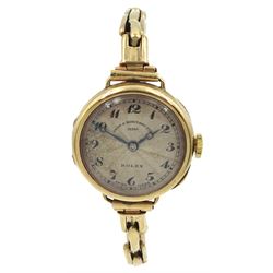 Rolex 9ct gold ladies manual wind wristwatch case No. 3592, the inside back case with personal inscription, the outer back case monogramed with initials, Glasgow import marks 1923, retailed by Owen & Robinson Ltd, Leeds, on gold expanding bracelet, stamped 9ct 