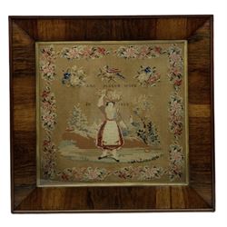 Victorian Berlin woolwork picture depicting a young woman collecting flowers in a landscape, within a floral border, 'Ann Scott's Work in 1852', in rosewood frame 87cm x 84cm overall
