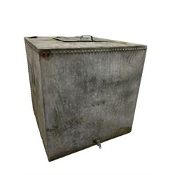 Large zinc riveted water tank, with one hinged lifting lid with tap on base 