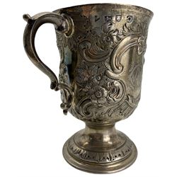 Early George III silver two handled cup with later embossed decoration and monogram, scroll handles and pedestal foot H13cm London 1769 Makers mark rubbed  