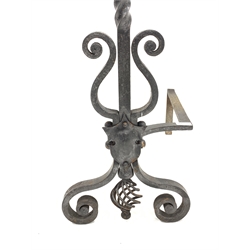 Pair of Blacksmith made wrought iron andirons, with hammered copper Yorkshire rose finials and scrolled decoration, 