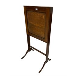 19th century mahogany travel desk, the fall front with writing inset and fitted interior for paper and inkwells, the reverse with scrap work and engravings, rectangular end supports with peg stretcher on cabriole feet 