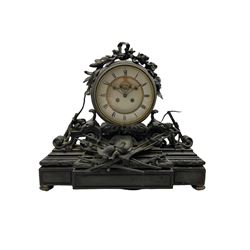 A large and imposing late 19th century French mantle clock with a breakfront plinth constructed from Belgium slate, case adorned with a display of numerous weapons and accruements of medieval warfare, drum movement case housing a large 7” two-part white enamel dial with Roman numerals, minute markers and steel moon hands, visible Brocot deadbeat escapement with cornelian pallets, dial attached to an eight-day rack striking movement striking the hours and half hours on a bell. With Pendulum. 


