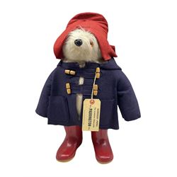 Paddington Bear by Gabrielle Designs with red hat, blue coat and red Dunlop wellingtons, complete with label H45cm