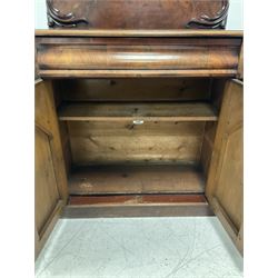 Victorian mahogany chiffonier, the raised back with applied scroll carved decoration, over cushion fronted frieze drawer and two panelled doors enclosing shelf, raised on skirted base W93cm