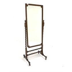 Early 20th century oak framed cheval mirror, geometric bevelled plate on rope twist supports, raised on castors, W60cm, H158cm