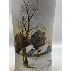 North European cylindrical vase painted with a Winter landscape H29cm, a late 19th century jardiniere similarly decorated with figures and buildings D20cm and an amber glass vase painted with a military scene H21cm