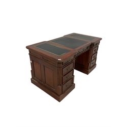 20th century mahogany partners desk, the inset top over three frieze drawers each side, over six drawers and two cupboards, raised on a plinth base W150cm, H79cm, D80cm 