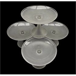 Set of four early 20th century frosted glass tazza, with ribbed rim on circular spreading foot, H15.5cm x D20.5cm 